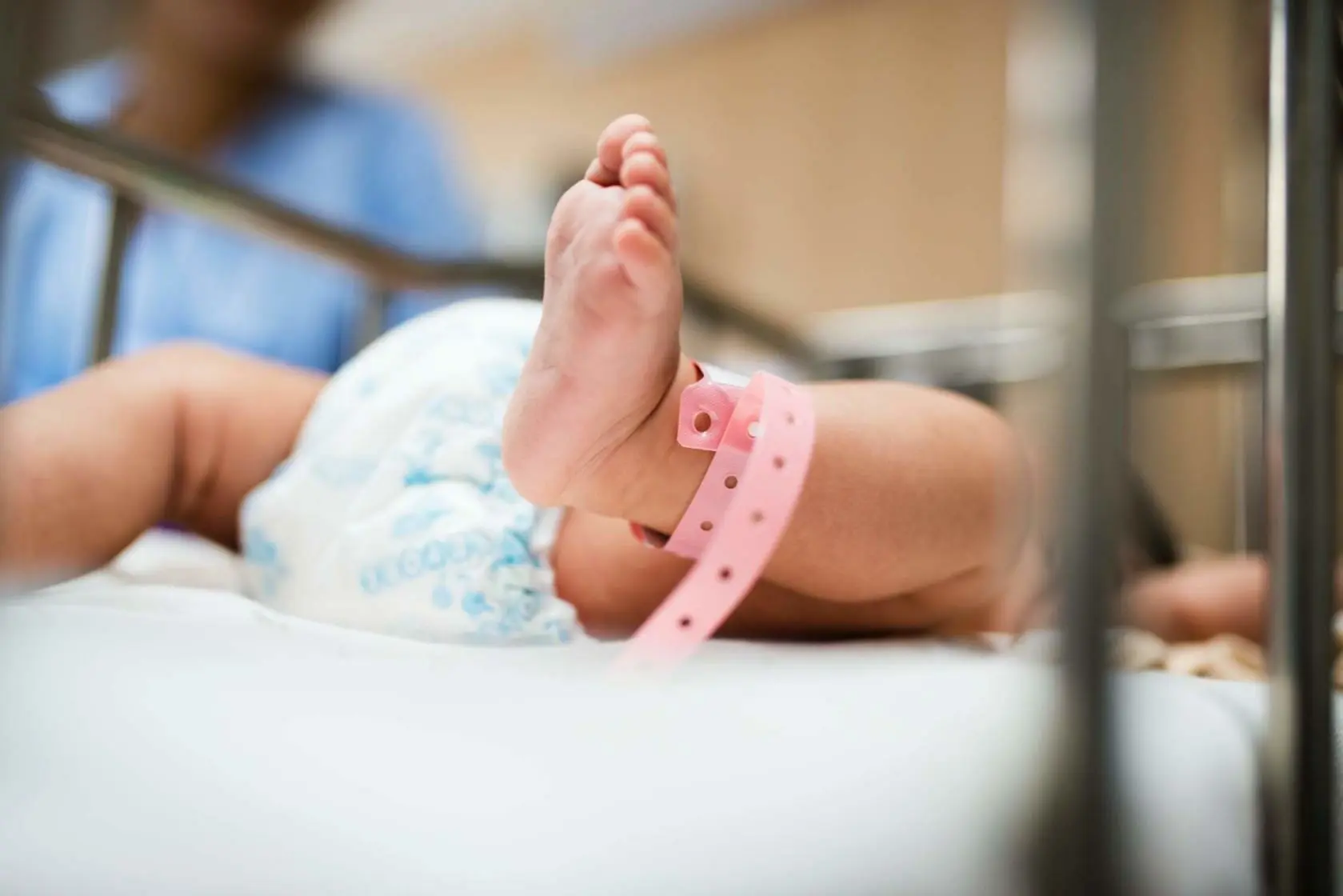 Baby Safety Month: Childproofing Your Home 1 Baby's feet with tag
