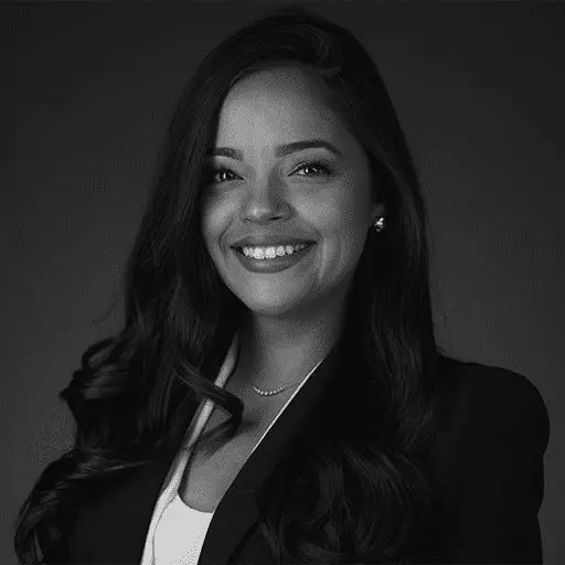 Abogados 18 Black and white portrait photo of Thomas J. Henry Attorney Jenna Cornejo