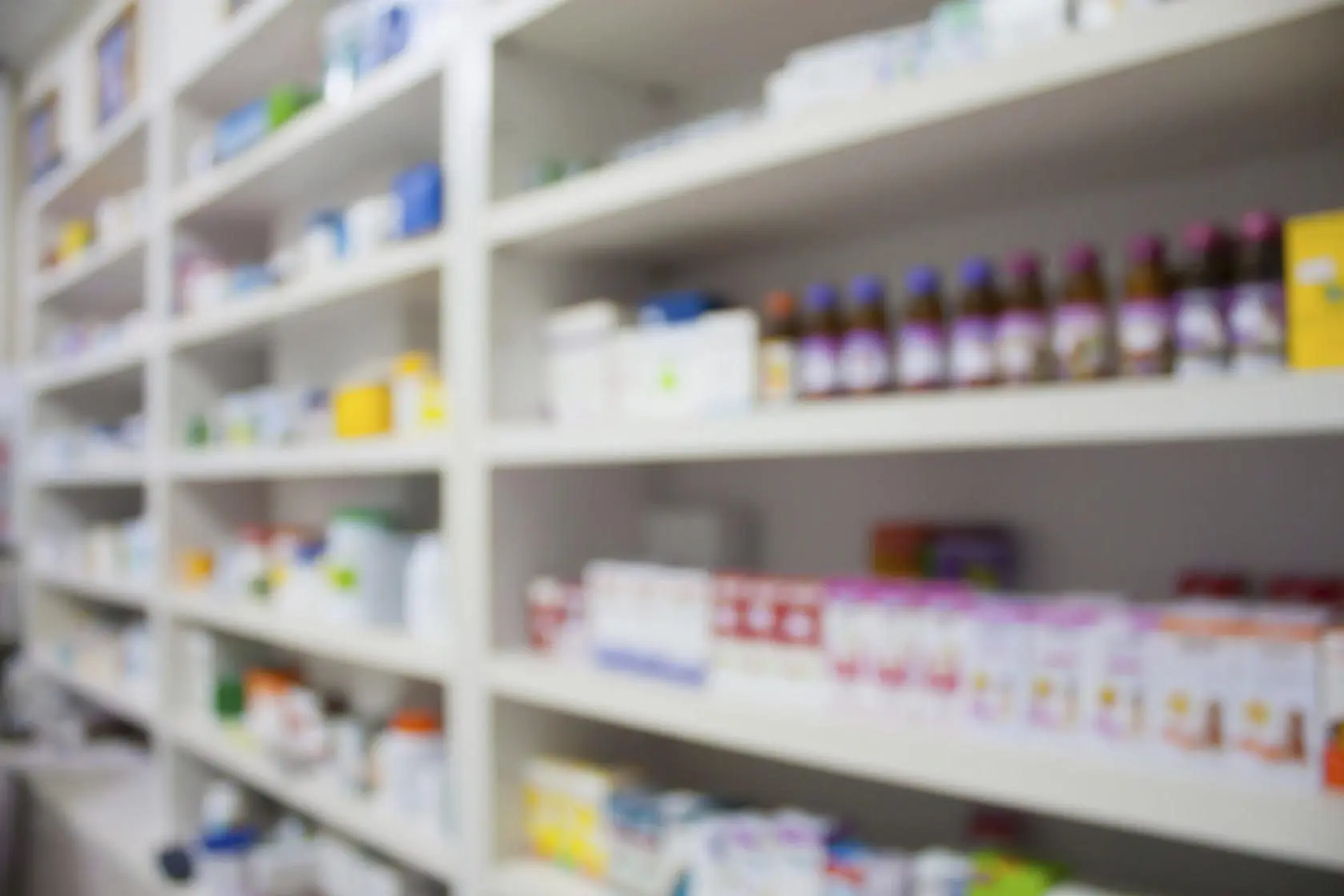 Blog pharmacy store drugs shelves interior blurred background 000084686393 Large scaled