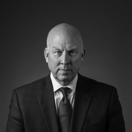 Black and white portrait photo of Thomas J. Henry Attorney Dale Hicks