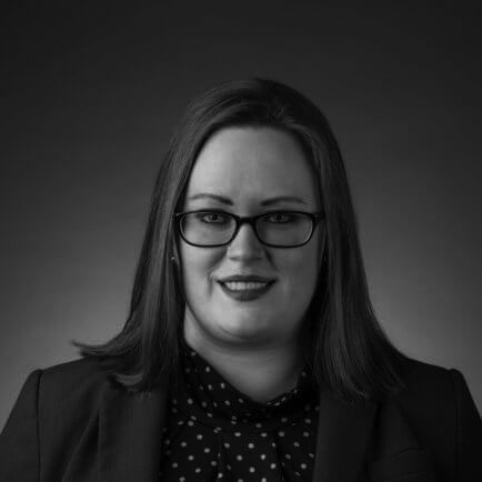 Black and white portrait photo of Thomas J. Henry Attorney Robin Trevino