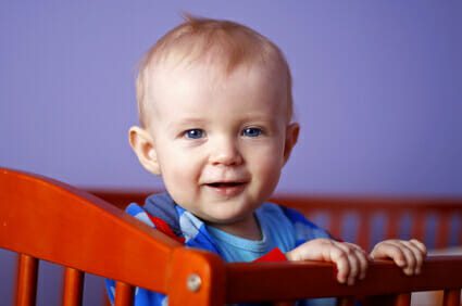 Baby boy in crib