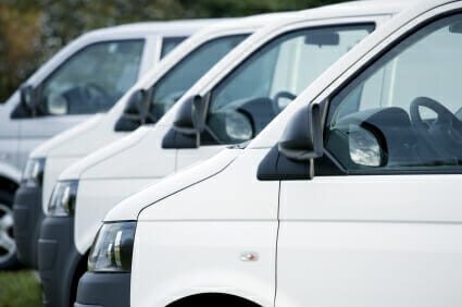 White vans lined up