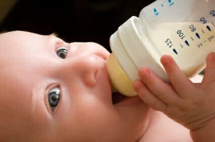 Baby drinking from a bottle