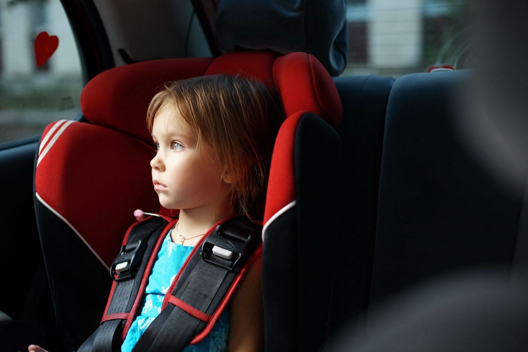 Infant sitting in car seat