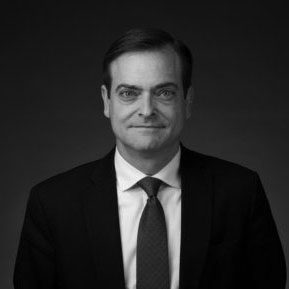 Black and white portrait photo of Thomas J. Henry Attorney Matthew W. Willis
