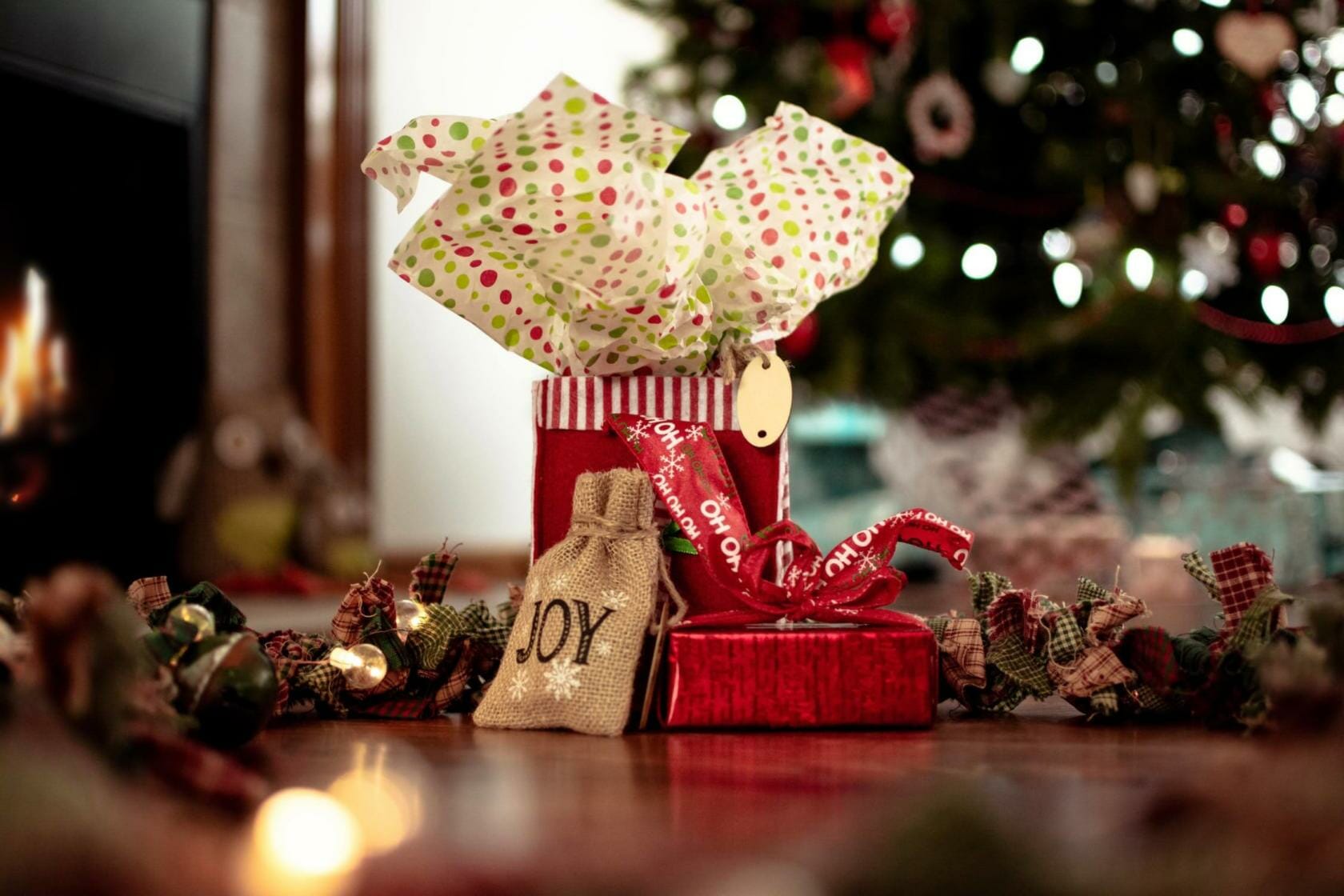 Christmas presents in front of tree