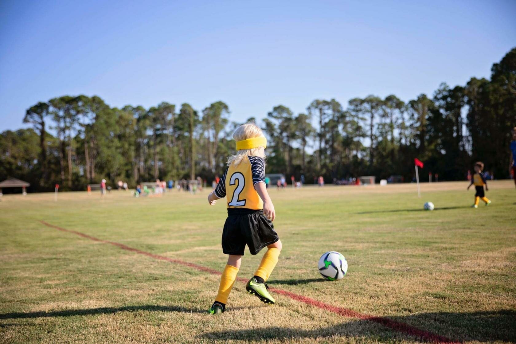 Child playing soccer