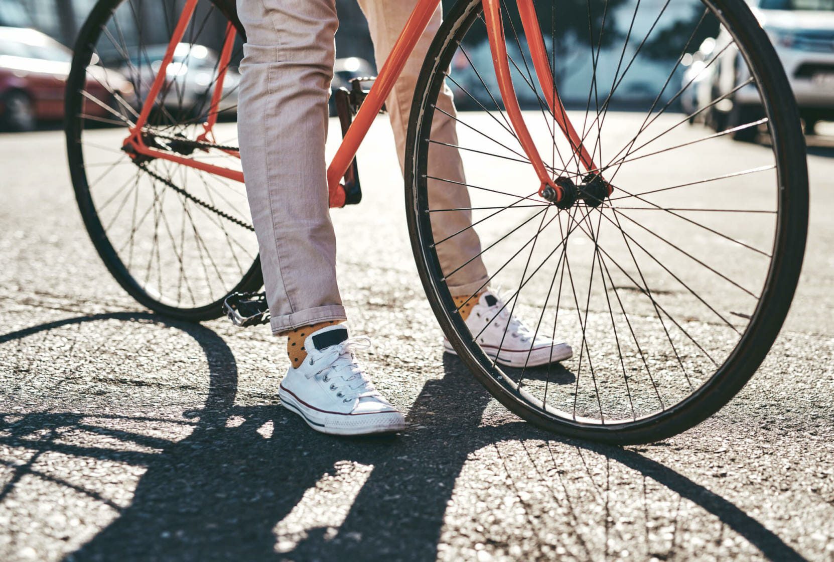 Cropped shot of a man out in the city with his bicycle