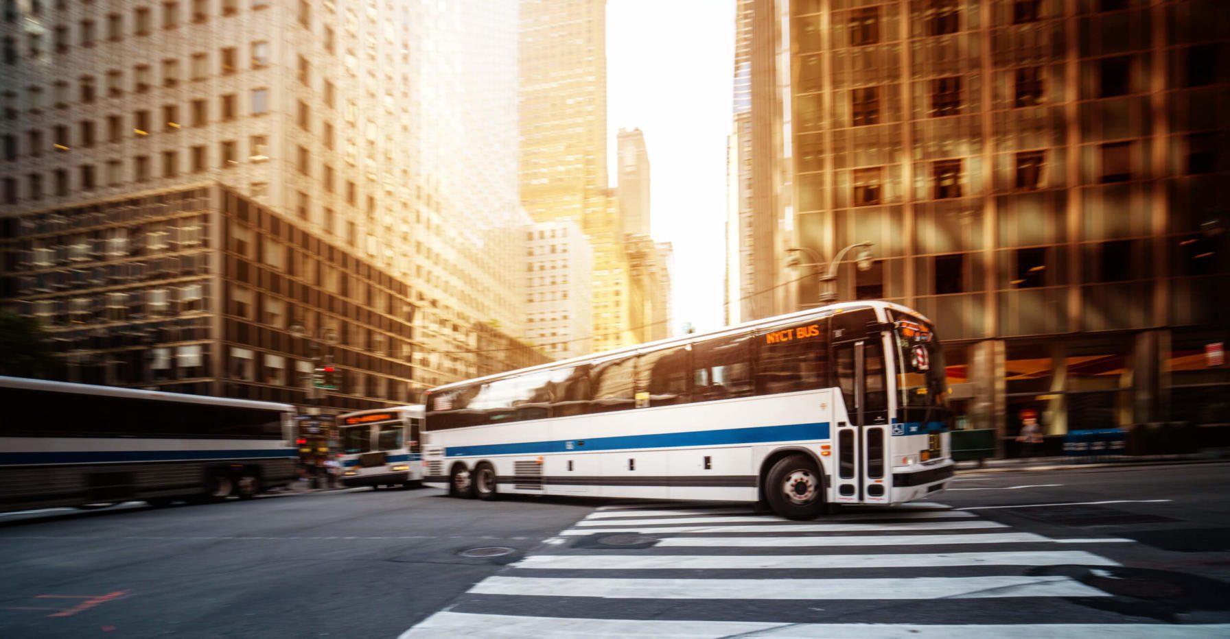 Bus turning onto an intersection in a metropolitan area