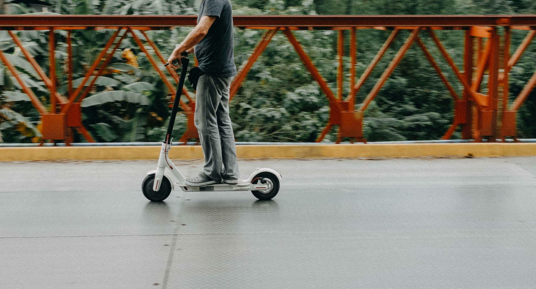 Man riding on scooter