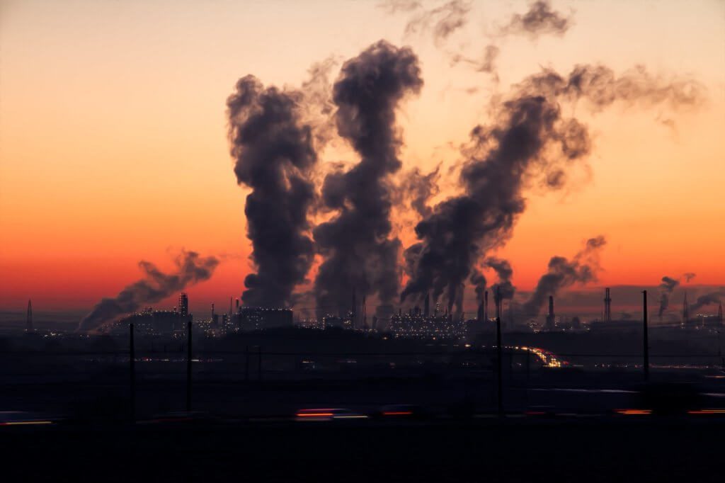 Smoke and steam coming from industrial facilities