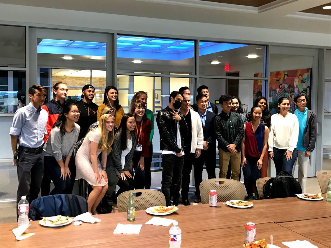 Alec Monopoly standing next to St. Davids Foundation scholarship recipients